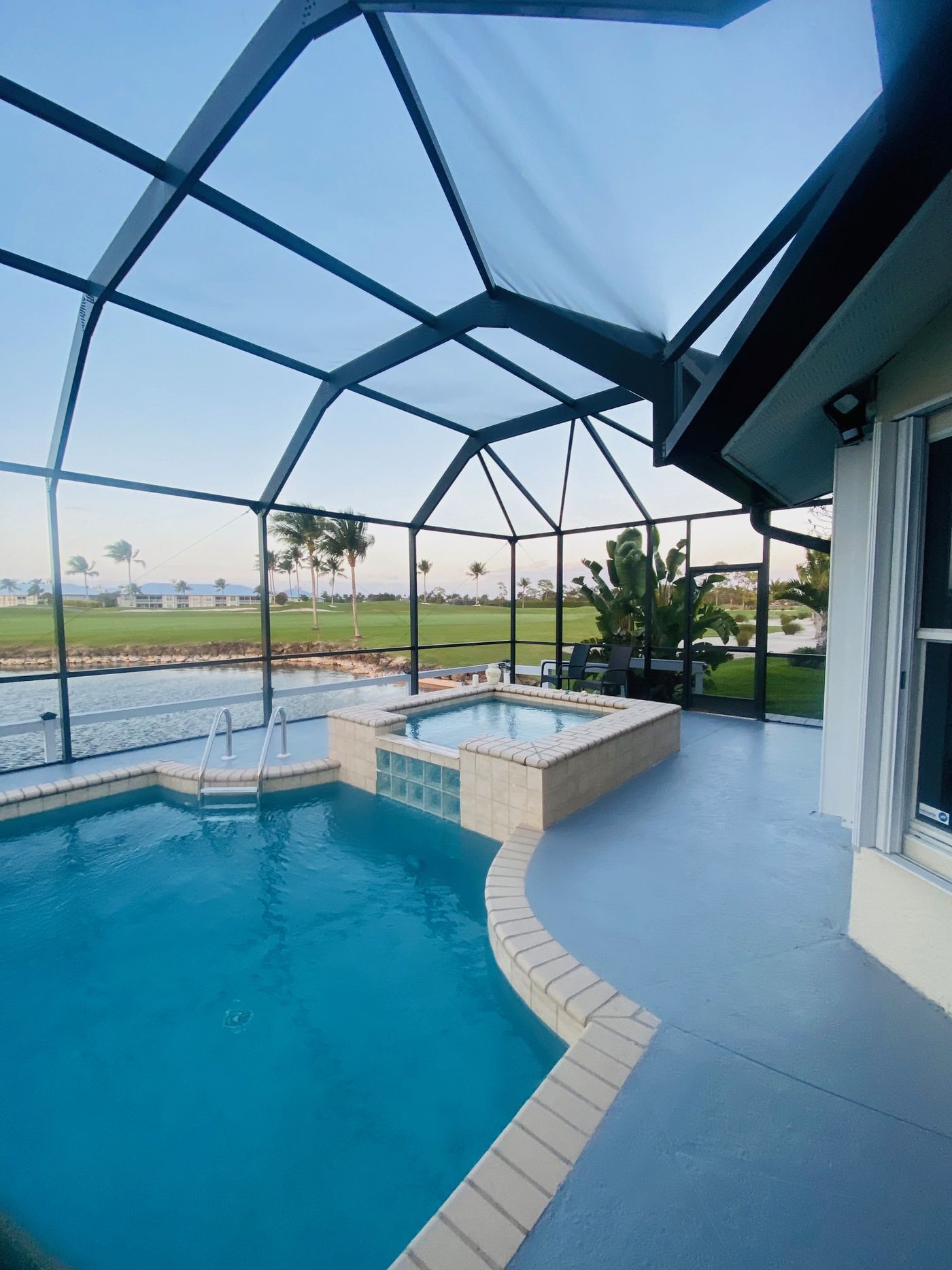 Nave-a-Lago — Screened pool and spa overlooking the lake