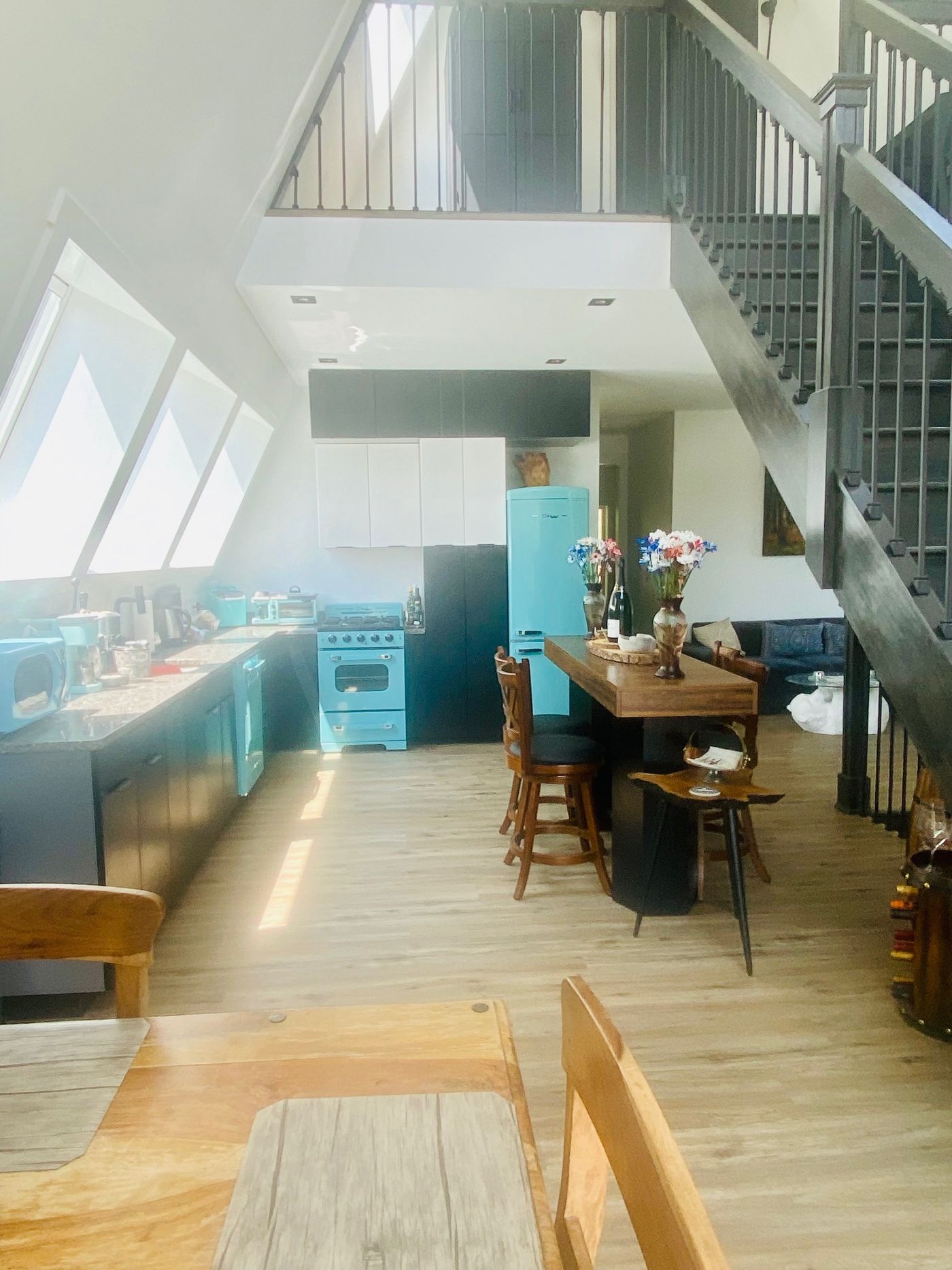 Reflection Ridge — Kitchen and dining under the A-frame