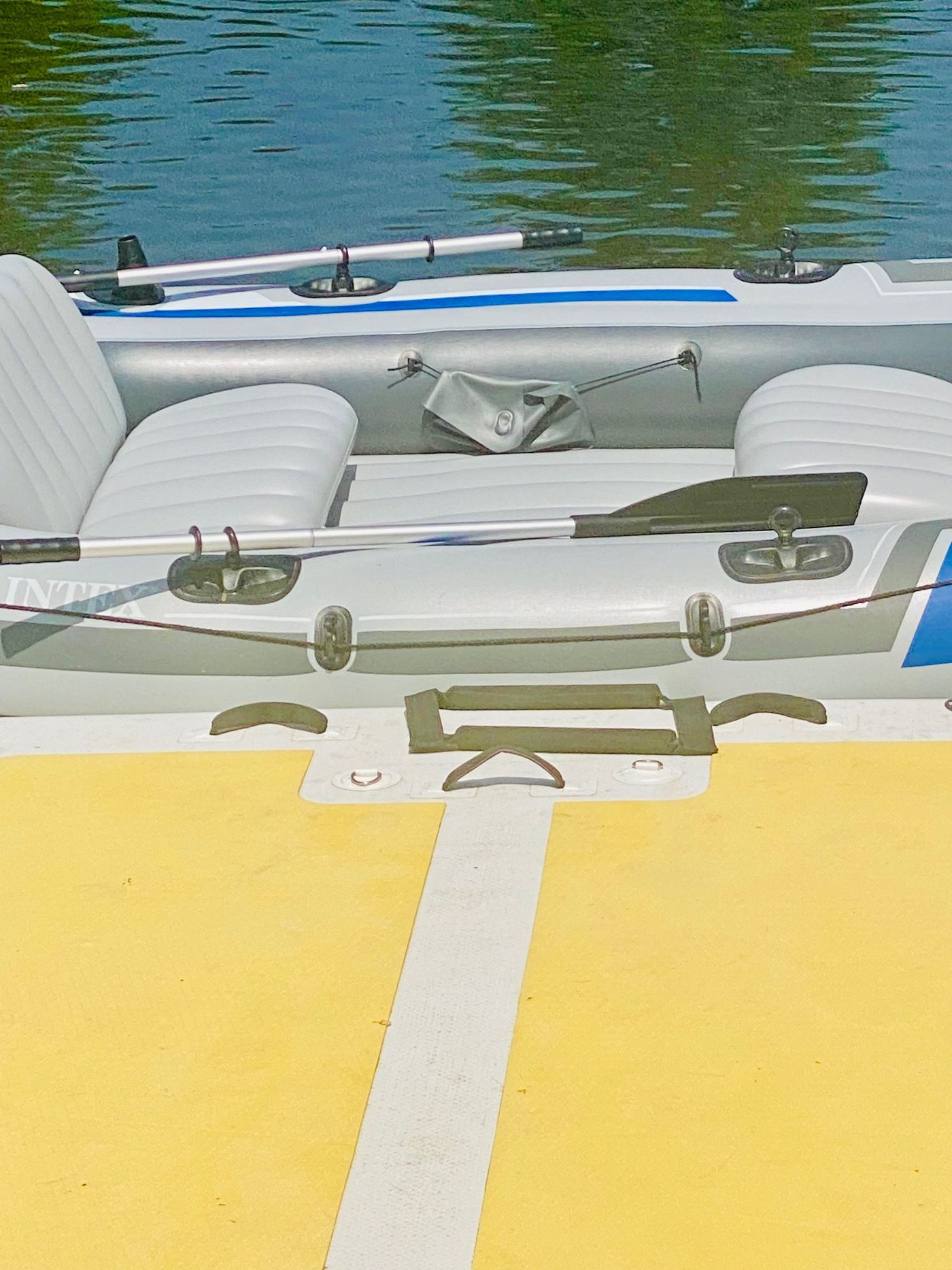 Reflection Ridge — Boat at the floating dock